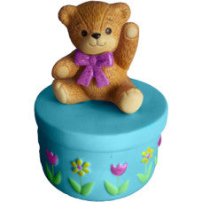 Teddy Bear Seated on Box